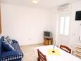 Living room Lumbarda, Living room in the apartment, air condition available and WiFi.