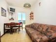 Dining room Lumbarda, Dining room in the apartment, air condition available, (pet friendly) and WiFi.