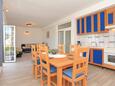 Dining room Lumbarda, Dining room in the apartment, air condition available and WiFi.