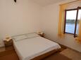Ložnice 1 Karbuni, Ložnice 1 v ubytování typu apartment, domácí mazlíčci povoleni a WiFi.