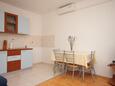 Soline, Dining room in the apartment, air condition available and WiFi.