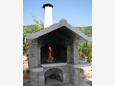 Soline, Dugi otok, Courtyard 448 - Apartments and Rooms near sea with pebble beach.
