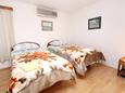 Ložnice 2 Korčula, Ložnice 2 v ubytování typu house, s klimatizací, domácí mazlíčci povoleni a WiFi.