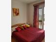 Orebić, Bedroom in the apartment, air condition available and WiFi.