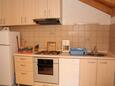 Vrboska, Kitchen in the apartment, (pet friendly) and WiFi.