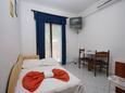 Dining room Arbanija, Dining room in the apartment, air condition available and WiFi.
