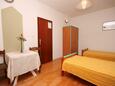 Nemira, Bedroom in the studio-apartment, air condition available and WiFi.