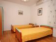 Nemira, Bedroom in the studio-apartment, air condition available and WiFi.