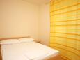 Schlafzimmer Omiš, Schlafzimmer in folgender Unterkunftsart studio-apartment, Klimaanlage vorhanden und WiFi.