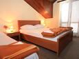 Ložnice Cavtat, Ložnice v ubytování typu room, s klimatizací a WiFi.
