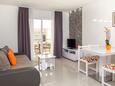 Living room Podgora, Living room in the apartment, air condition available and WiFi.