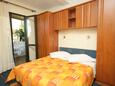 Ložnice Podgora, Ložnice v ubytování typu studio-apartment, s klimatizací a WiFi.