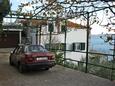 Parkiralište Mimice, Omiš, Parkiralište 4797 - Apartmani sa šljunčanom plažom.