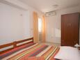 Bedroom 1 Duće, Bedroom 1 in the apartment, air condition available, (pet friendly) and WiFi.