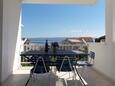 Terrace 1 Duće, Terrace 1 in the apartment, with a sea view, (pet friendly) and WiFi.