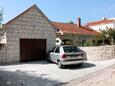 Parking lot Sumartin, Brač, Parking lot 4803 - Apartments near sea with pebble beach.