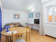 Obývací pokoj Trogir, Obývací pokoj v ubytování typu apartment, s klimatizací a WiFi.