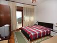 Spavaća soba Lokva Rogoznica, Spavaća soba u smještaju tipa apartment.