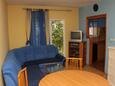Living room Baška Voda, Living room in the apartment, air condition available, (pet friendly) and WiFi.
