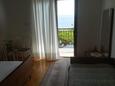 Nemira, Dormitor în unitate de cazare tip apartment, aer condiționat disponibil şi WiFi.