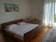 Nemira, Dormitor în unitate de cazare tip apartment, aer condiționat disponibil şi WiFi.