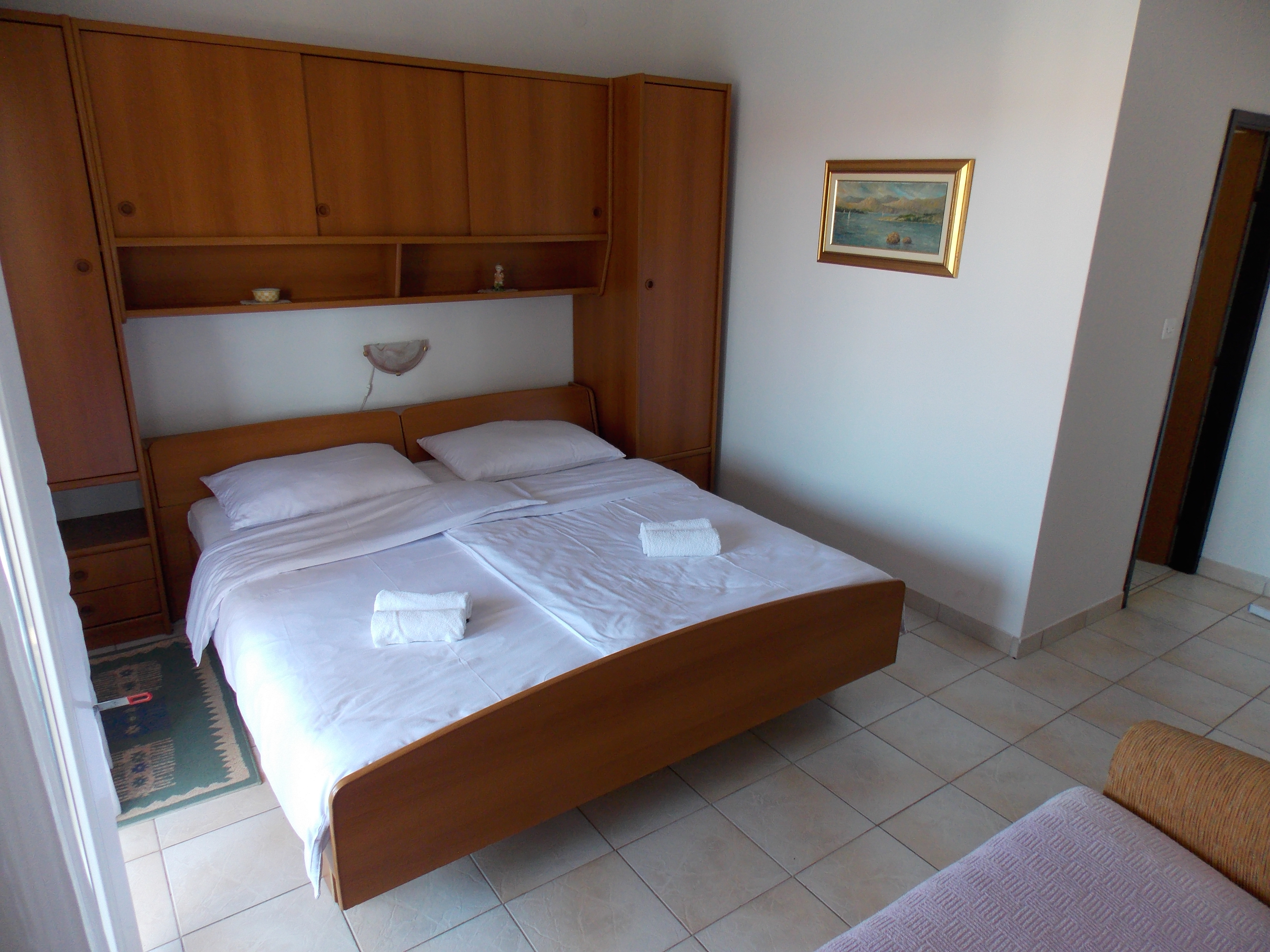 Room with balcony and sea view Barbat (Rab) (S-4862-a)