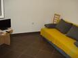 Saplunara, Living room in the apartment, air condition available and WiFi.