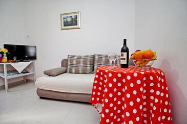 Okuklje, Sala de estar in the apartment, air condition available y WiFi.