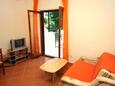 Saplunara, Sala de estar in the apartment, (pet friendly) y WiFi.