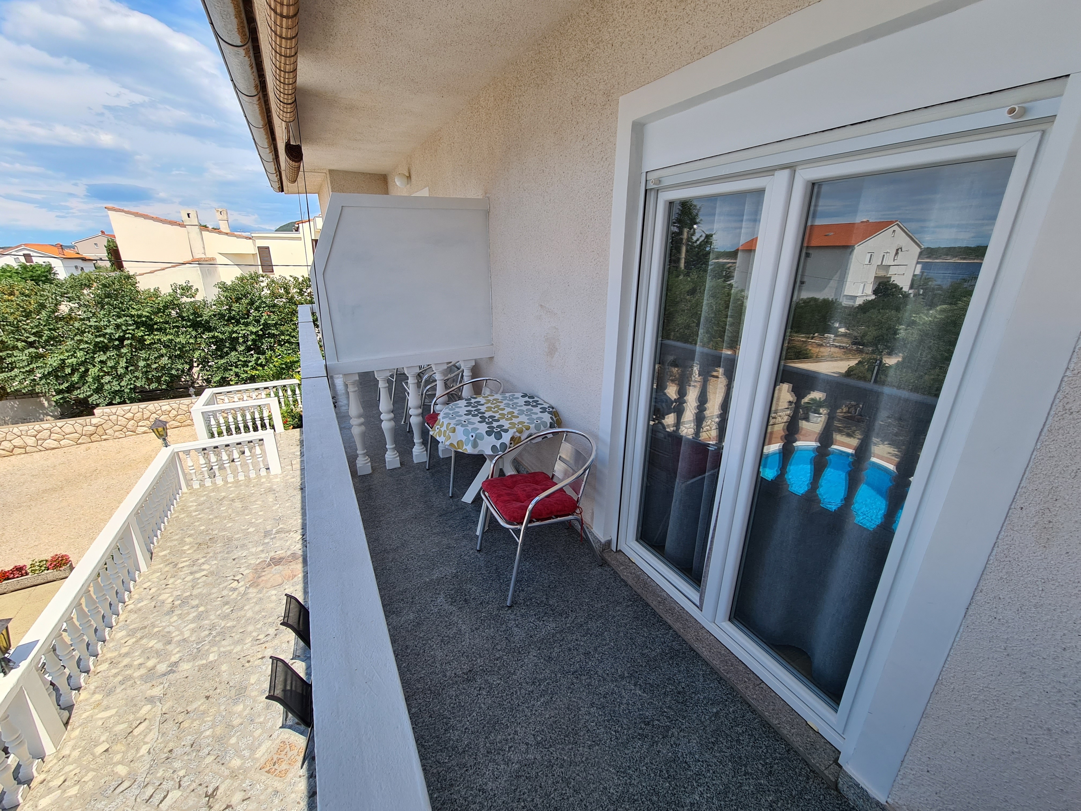 Two bedroom apartment with balcony and sea view Barbat, Rab  A-c