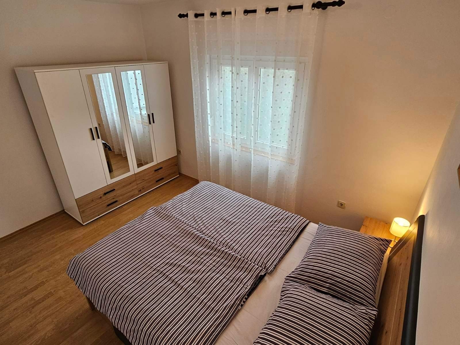 Two bedroom apartment with balcony and sea view Barbat, Rab  A-c