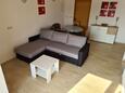 Barbat, Living room in the apartment, air condition available and WiFi.