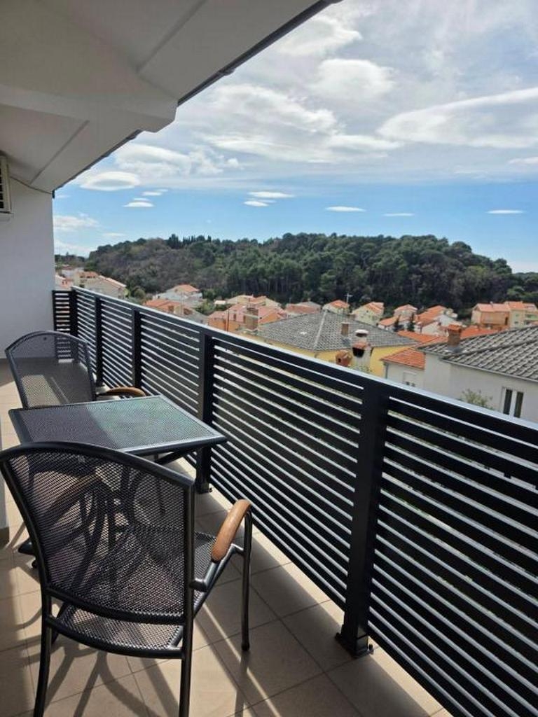 One bedroom apartment with balcony and sea view Palit, Rab  A-a
