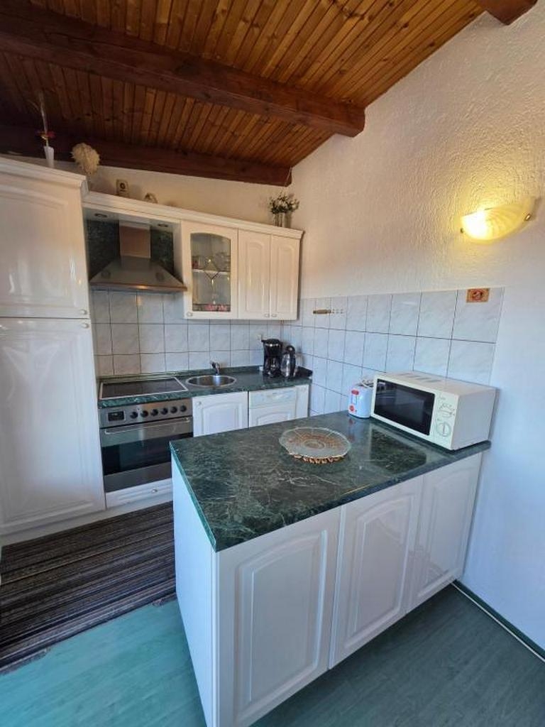One bedroom apartment with balcony and sea view Palit, Rab  A-a