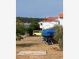 Barbat, Rab, Parking lot 4993 - Apartments near sea with pebble beach.