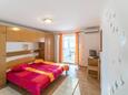 Ložnice Palit, Ložnice v ubytování typu apartment, s klimatizací, domácí mazlíčci povoleni a WiFi.