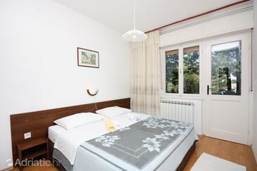 Bedroom Supetarska Draga - Donja, Bedroom in the room.