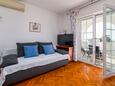 Obývací pokoj Banjol, Obývací pokoj v ubytování typu apartment, s klimatizací a WiFi.