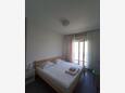 Spavaća soba 1 Supetarska Draga - Donja, Spavaća soba 1 u smještaju tipa apartment, WiFi.