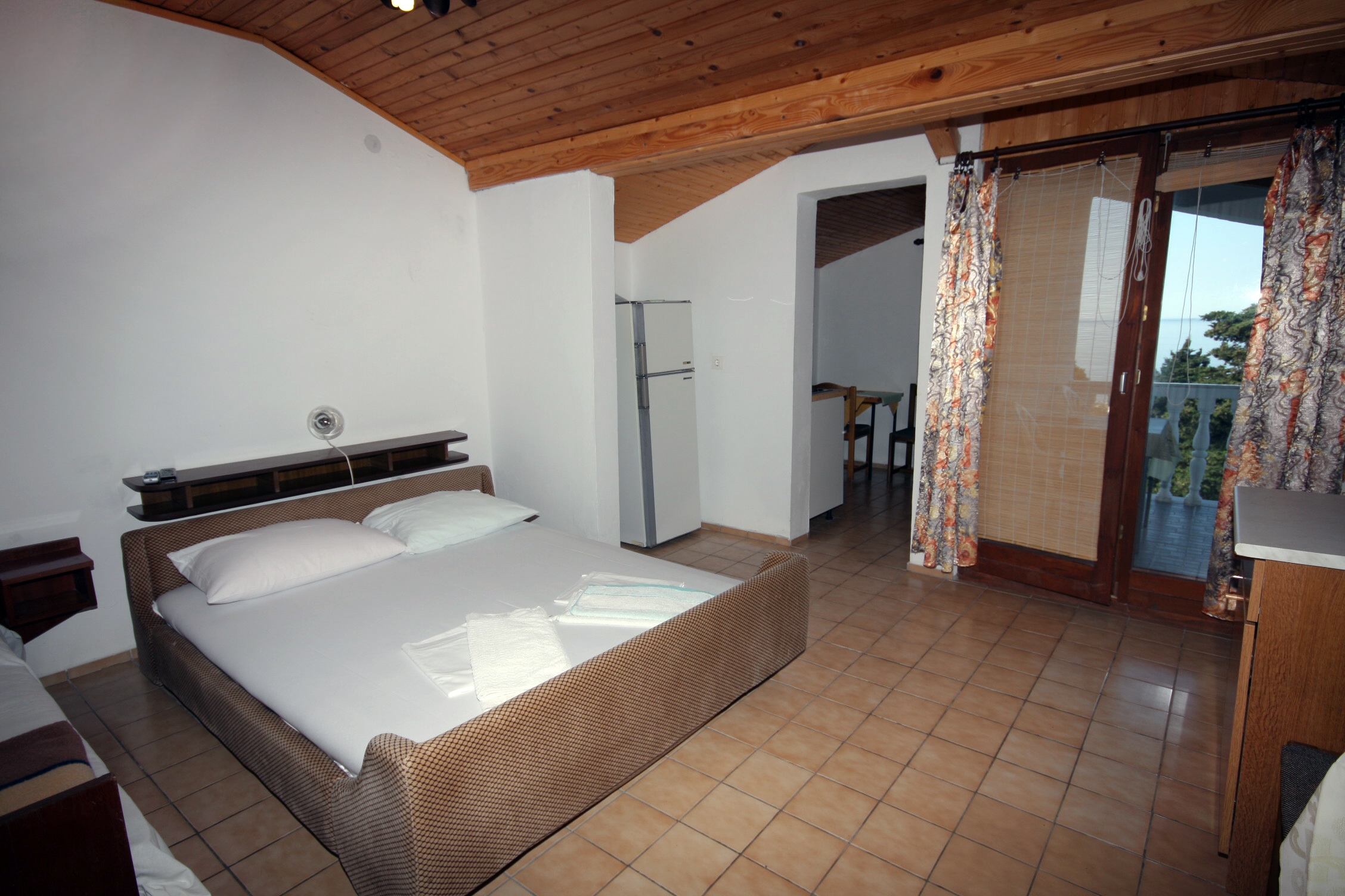 Studio flat with terrace and sea view Suha Punta (Rab) (AS-5050-b)