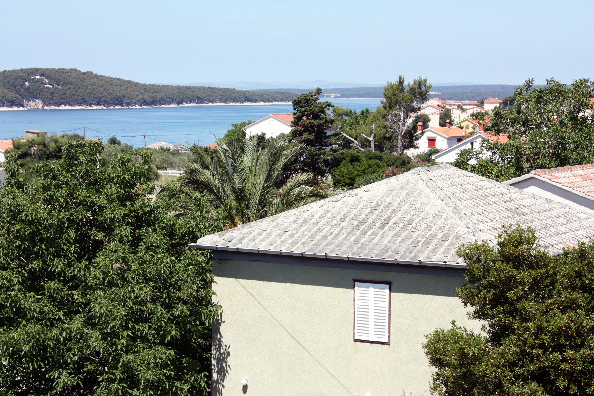 Two bedroom apartment with terrace and sea view Barbat, Rab  A-a