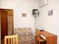 Living room Tisno, Living room in the studio-apartment, air condition available and WiFi.