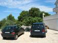 Jezera, Murter, Parkeerplaats 5079 - Appartementen with pebble beach.