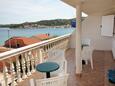 Terrace Tisno, Terrace in the apartment, with a sea view.