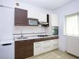 Murter, Kitchen in the apartment, (pet friendly) and WiFi.