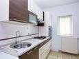 Murter, Kitchen in the apartment, (pet friendly) and WiFi.