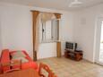 Murter, Sala de estar in the apartment, air condition available y WiFi.