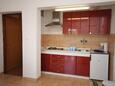 Tisno, Kitchen in the studio-apartment, (pet friendly) and WiFi.