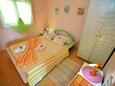 Slaapkamer Murter, Slaapkamer in the apartment, (pet friendly) en WiFi.
