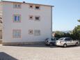 Parking lot Murter, Murter, Parking lot 5099 - Apartments with pebble beach.